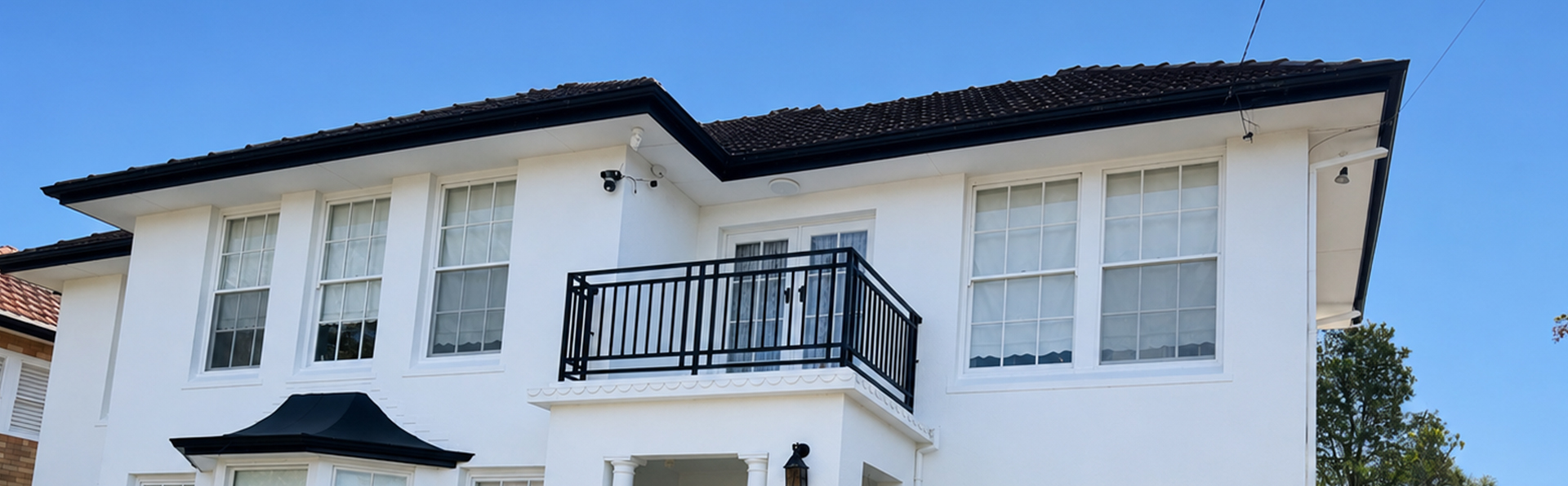Leafy double-storey family home in St Ives surrounded by bushland, painted by ProLux