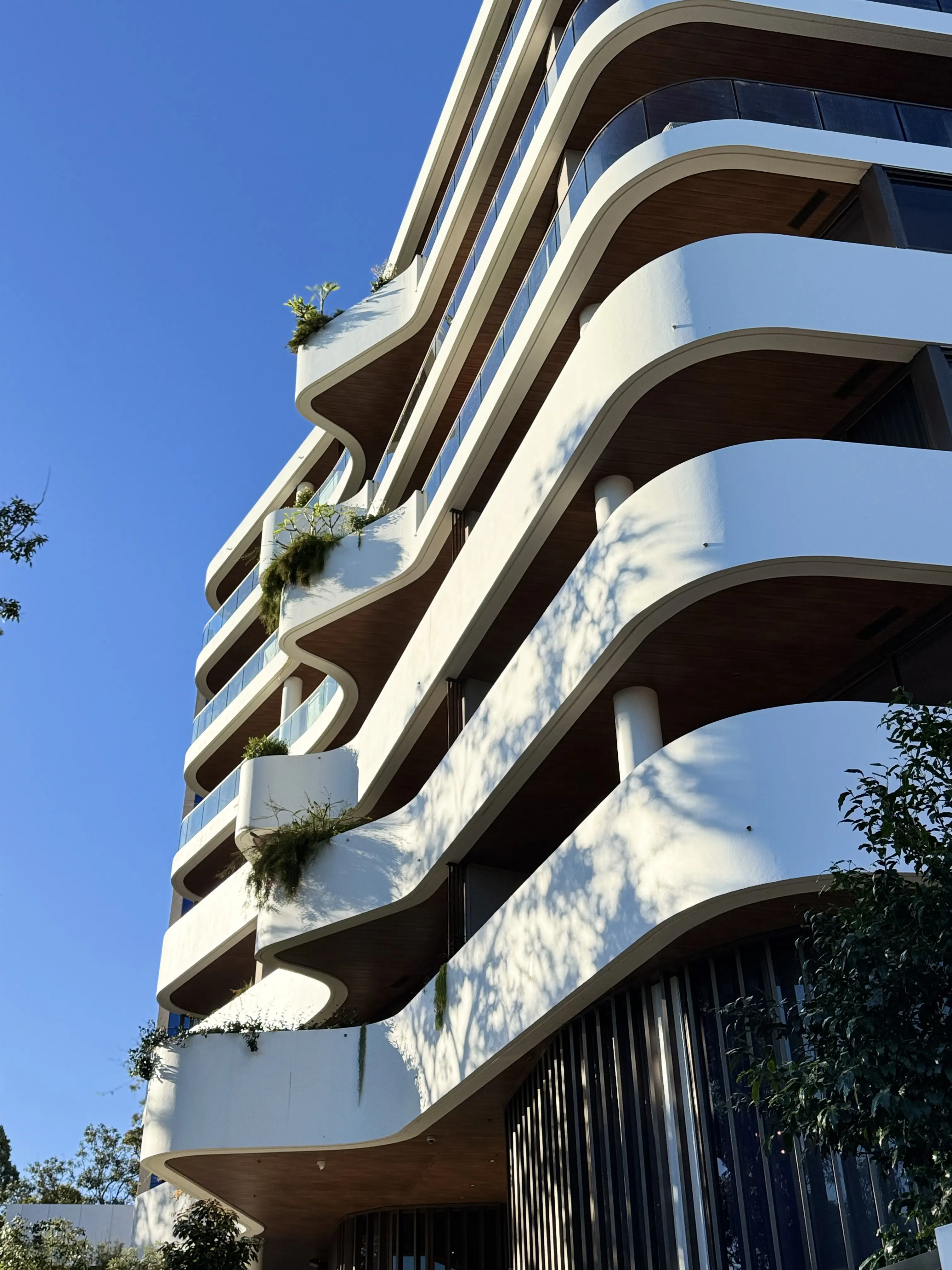 Repainted strata apartment block facade in Neutral Bay
